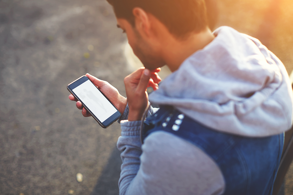 student on phone mental health