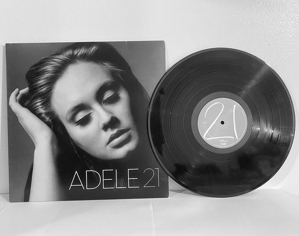 Miami, Fl, USA - February 01, 2021: Adele music album on vinyl record LP disc. This album is titled 21.