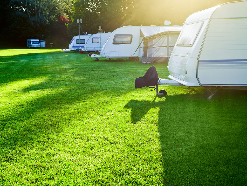 Travel trailer camping in a morning light